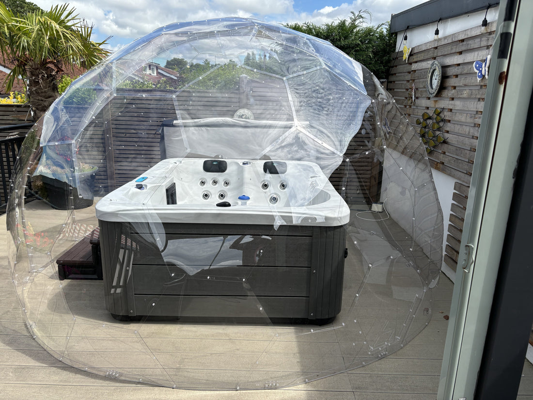 A hot tub inside a GeoDomeX garden dome