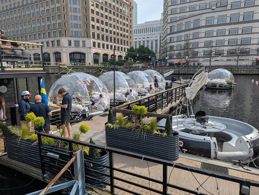 Floating GeoDomeX domes on the water in London Docklands